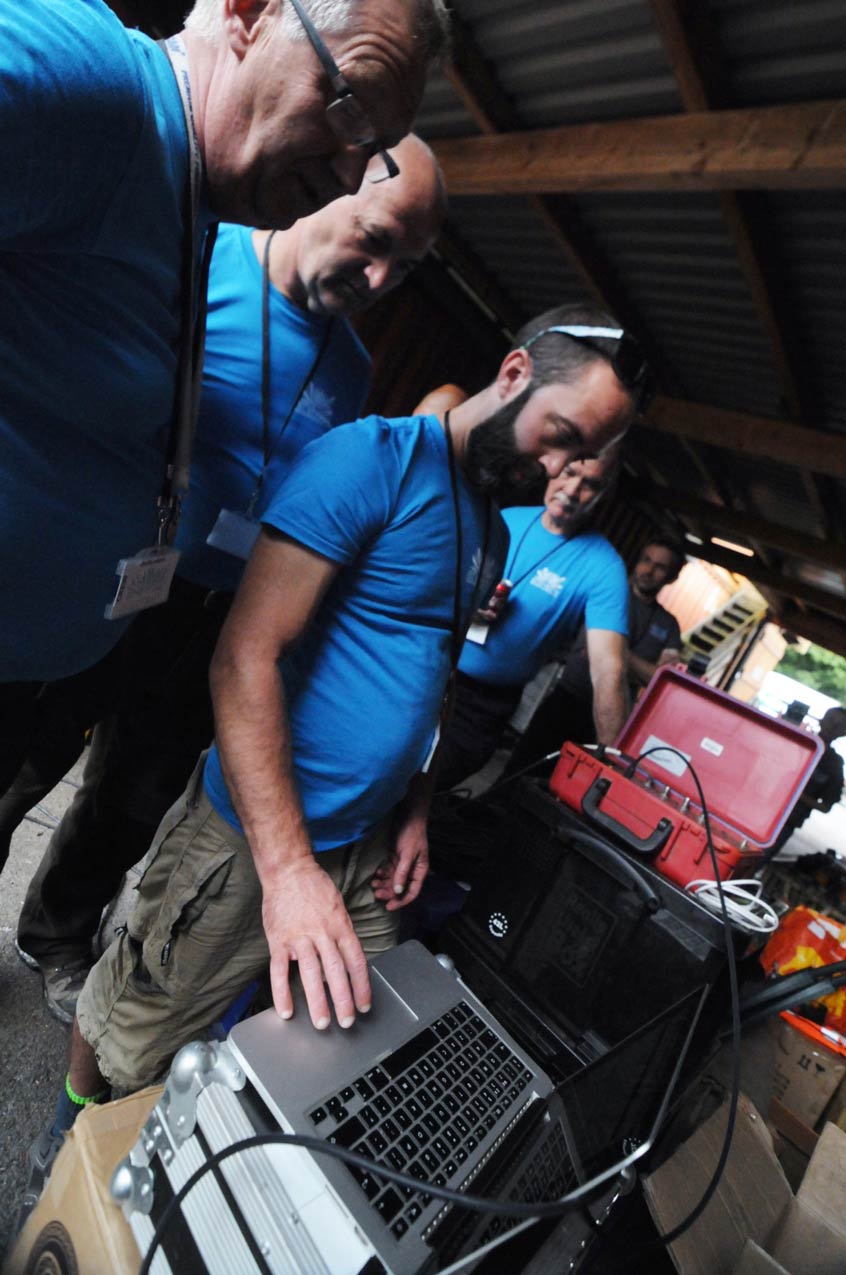 The Electrify crew at the control desk, wiring up the pyromusical show ahead of a display